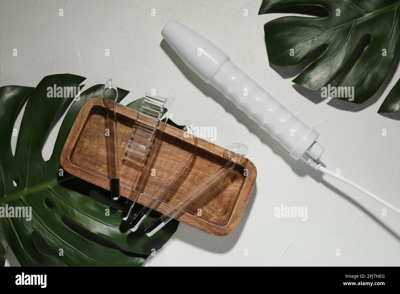 Flat lay composition with darsonval and different nozzles on white ...