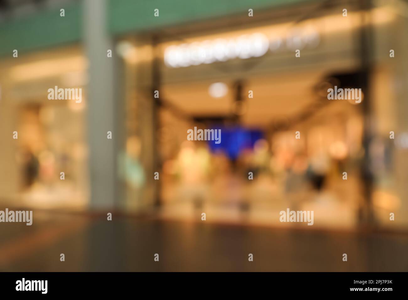 Blurred view of shopping mall interior. Bokeh effect Stock Photo - Alamy