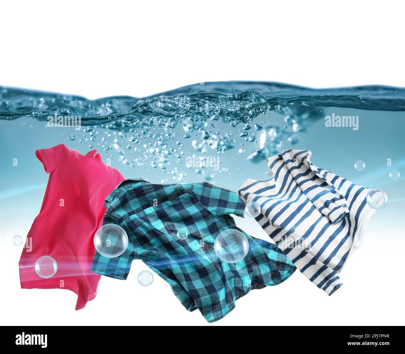 Washing powder bubbles and clothes in water Stock Photo Alamy