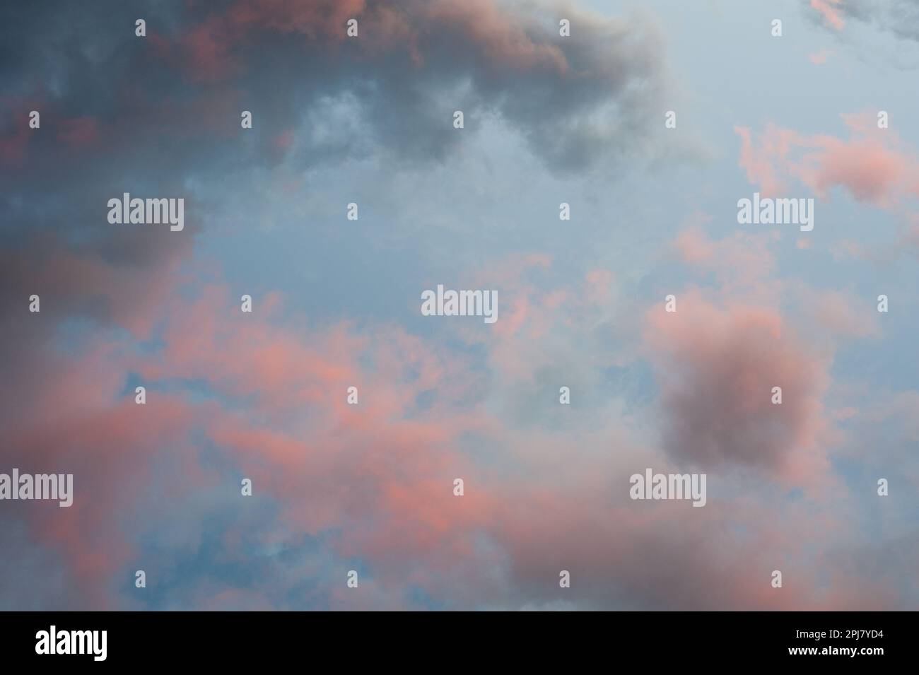 Backlit abstract clouds at sunset Stock Photo