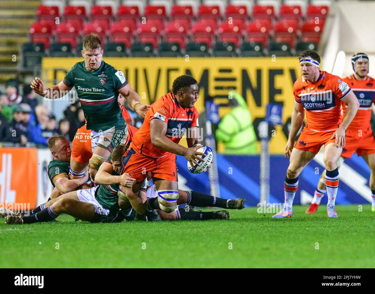 Leicester Tigers Rugby v Edinburgh Rugby Team at the Mattioli Stadium in Leicester, UK on 31 March 2023.  Viliame Mata (Edinburgh) tackled at the Mattioli Rugby Stadium, Leicester, Uk  Credit: Mark Dunn/Alamy Live News Stock Photo