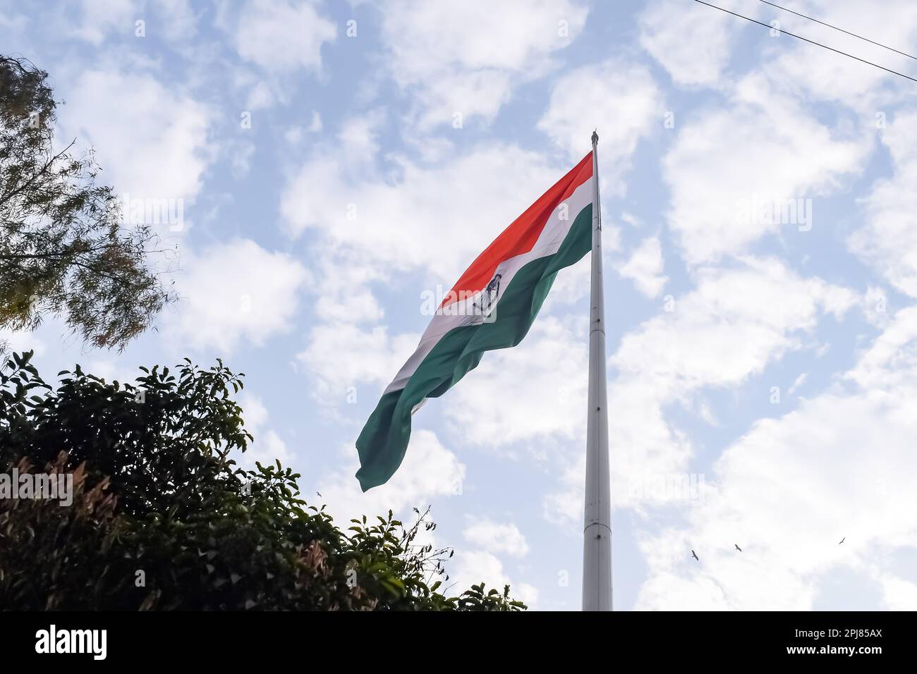 India flag flying high at Connaught Place with pride in blue sky, India ...