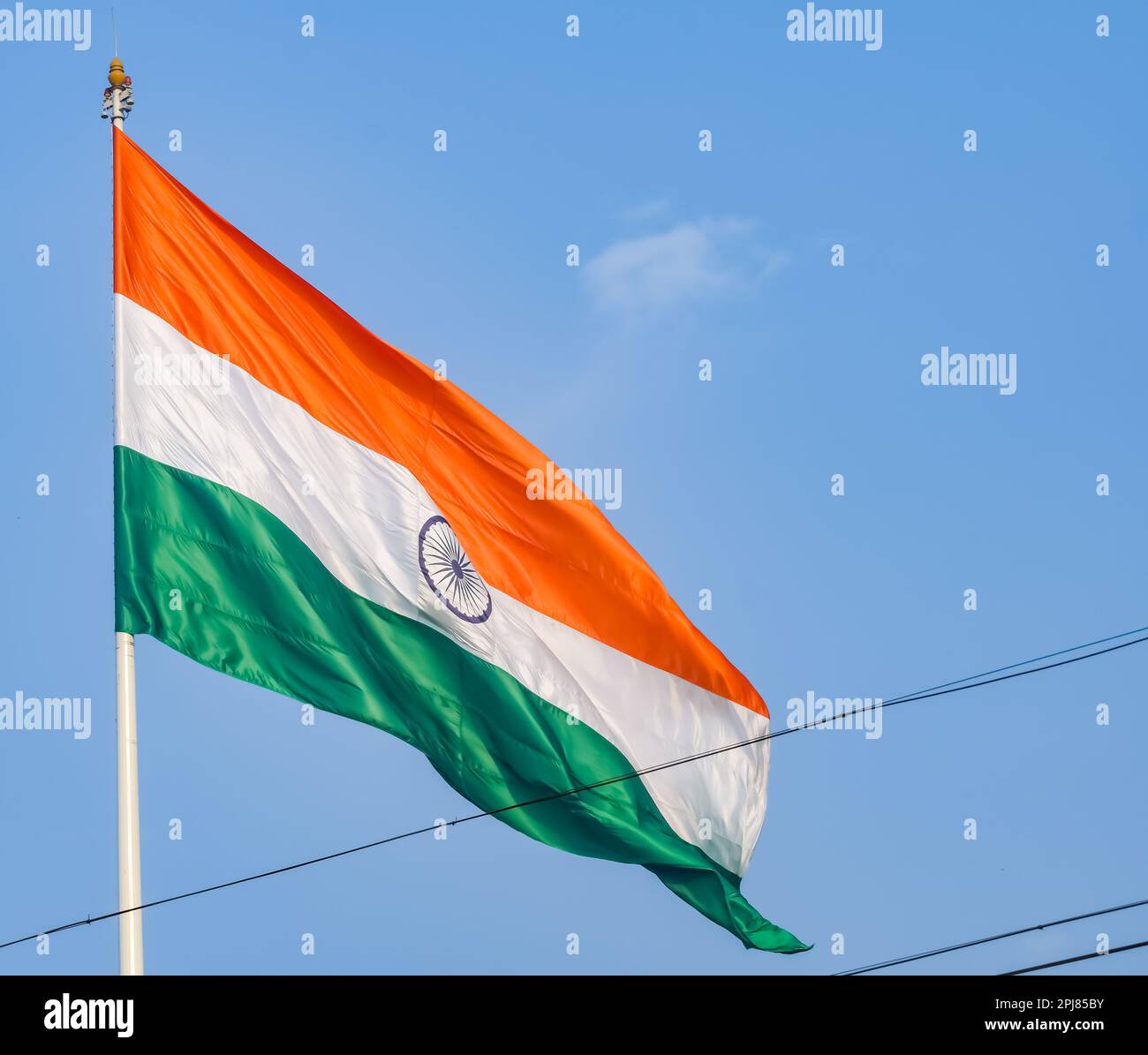 India flag flying high at Connaught Place with pride in blue sky, India ...