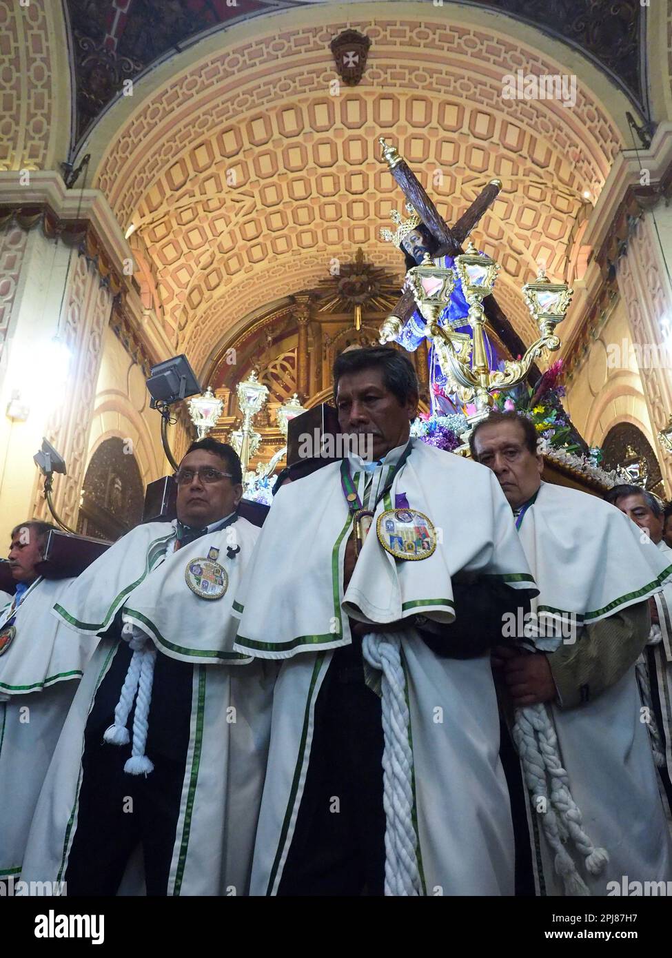 Devotees carrying a religious image leading the Friday of Sorrows ...