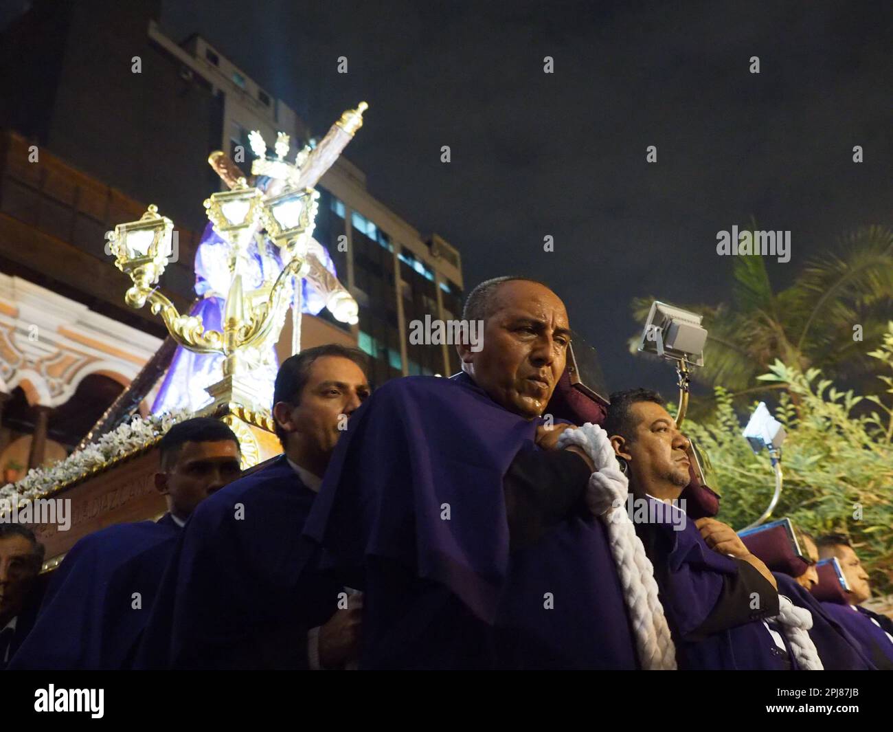 Devotees carrying a religious image leading the Friday of Sorrows ...