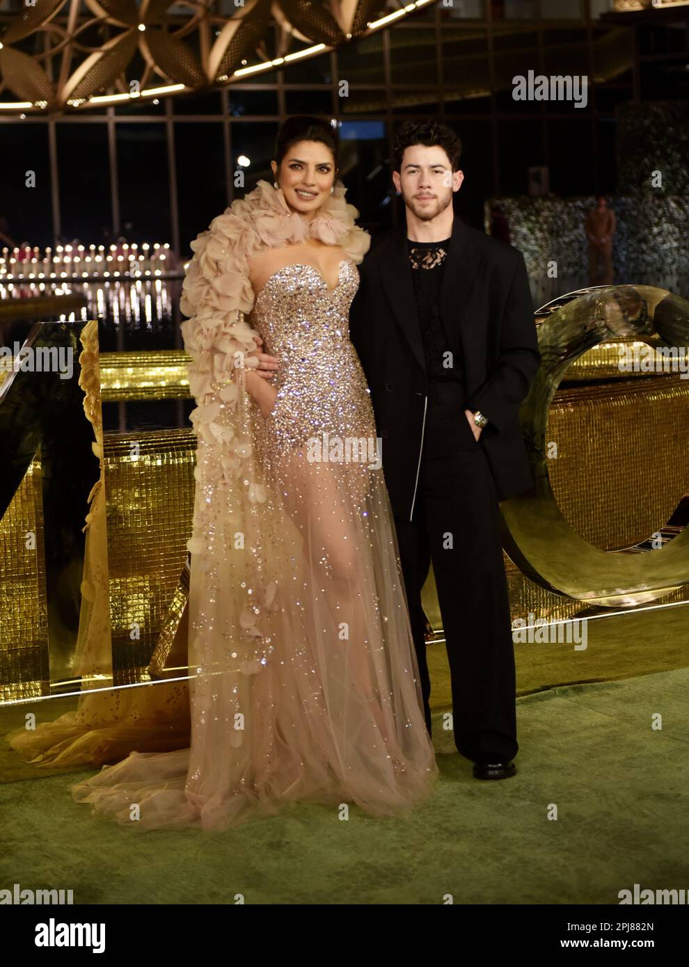 Indian actress and producer Priyanka Chopra Jonas (L) and her husband musician Nick Jonas pose for pictures on the first day of the openings of Nita Mukesh Ambani Cultural Centre in Mumbai, India, 31 March, 2023. (Photo by Indranil Aditya/NurPhoto)0 Credit: NurPhoto SRL/Alamy Live News Stock Photo