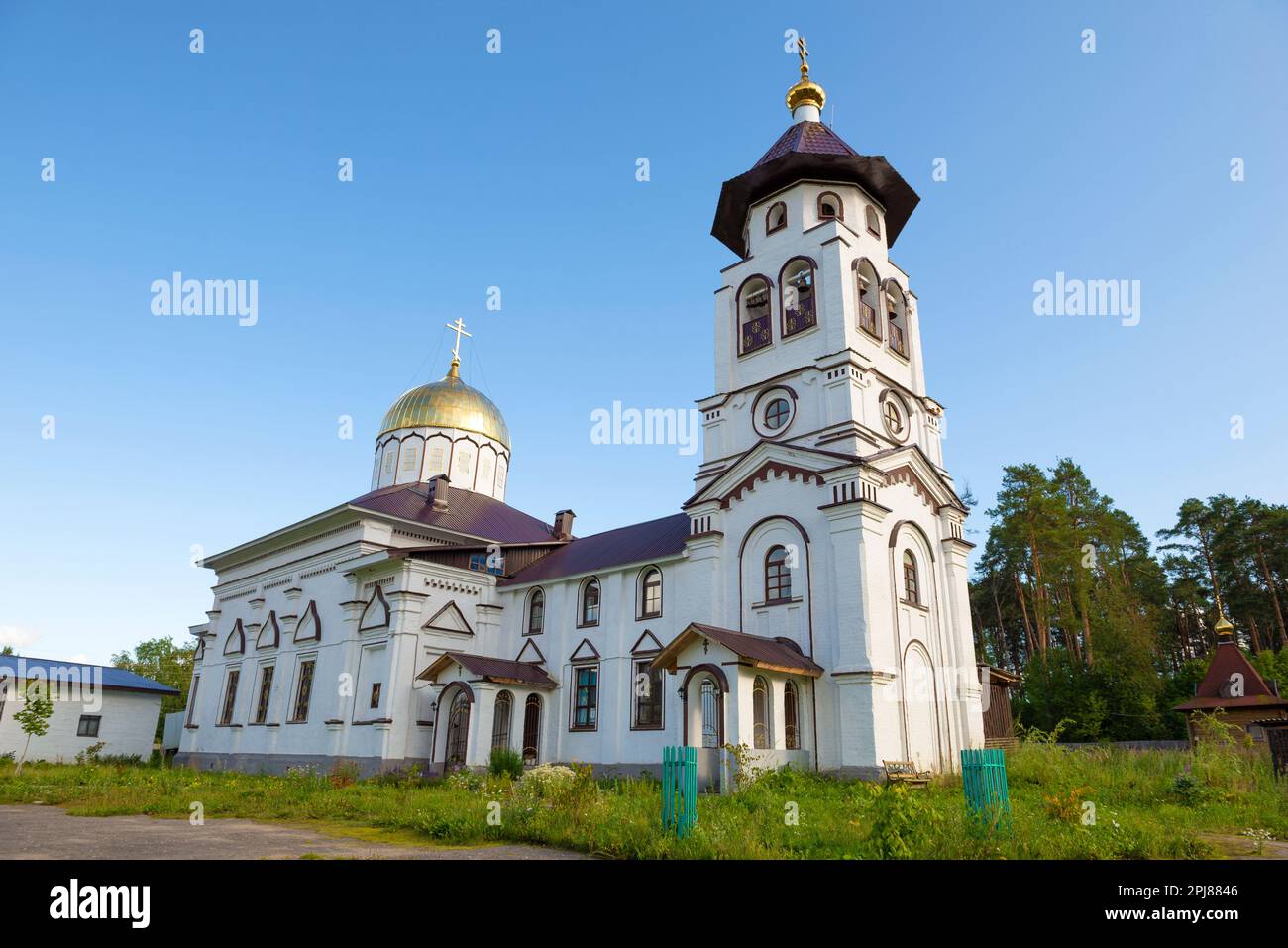 Church of Alexander Nevsky (1903) on an August afternoon. Pudozh, Karelia. Russian Federation Stock Photo