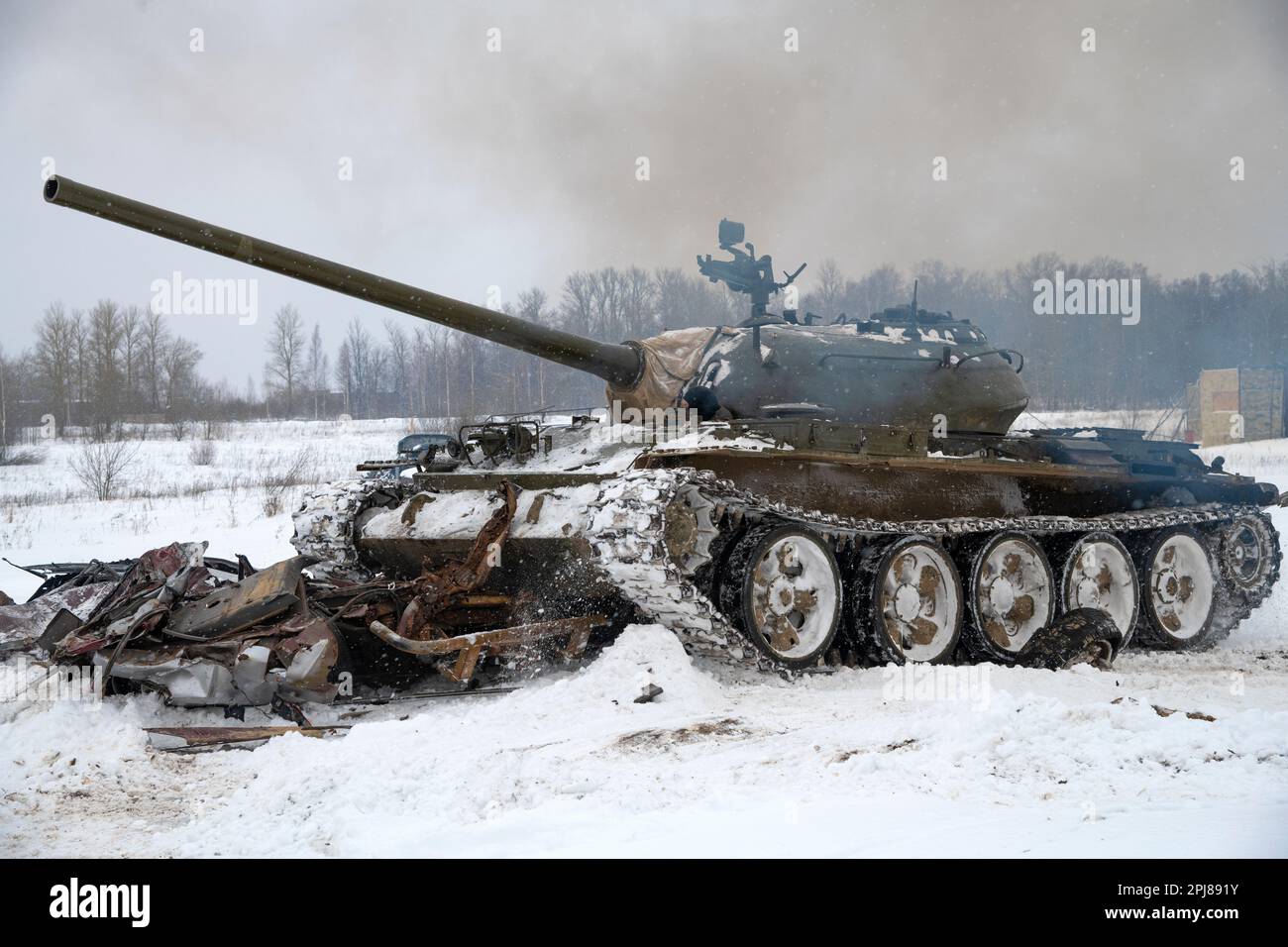 KRASNOYE SELO, RUSSIA - FEBRUARY 19, 2023: A Soviet tank T-54 a close-up on a snowy February day. Training ground of the military-historical park Stock Photo