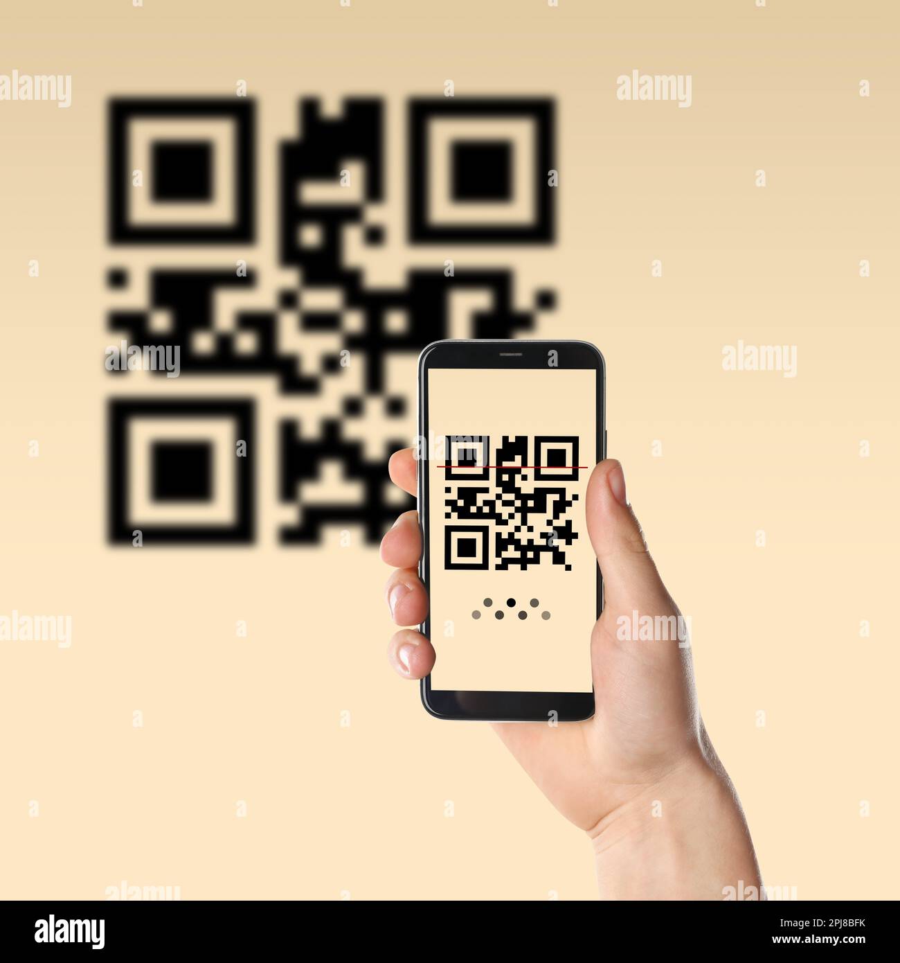 Woman scanning QR code with smartphone on beige background, closeup ...