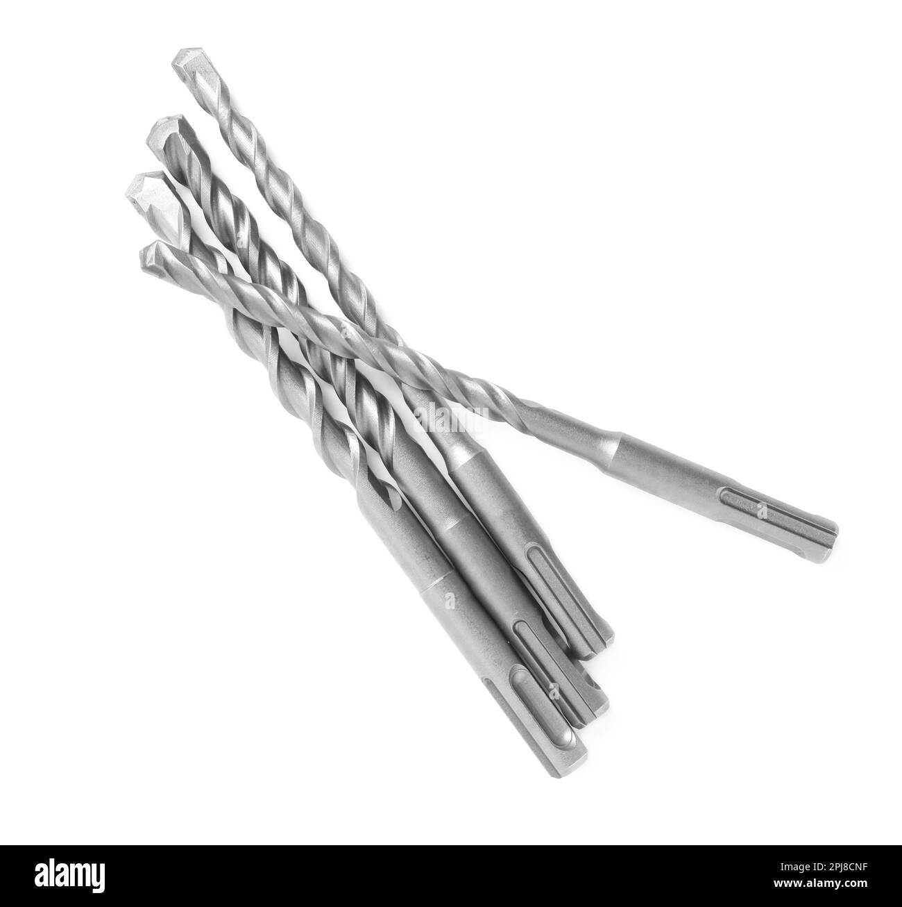 Many twist drill bits isolated on white, top view. Carpenter's tools