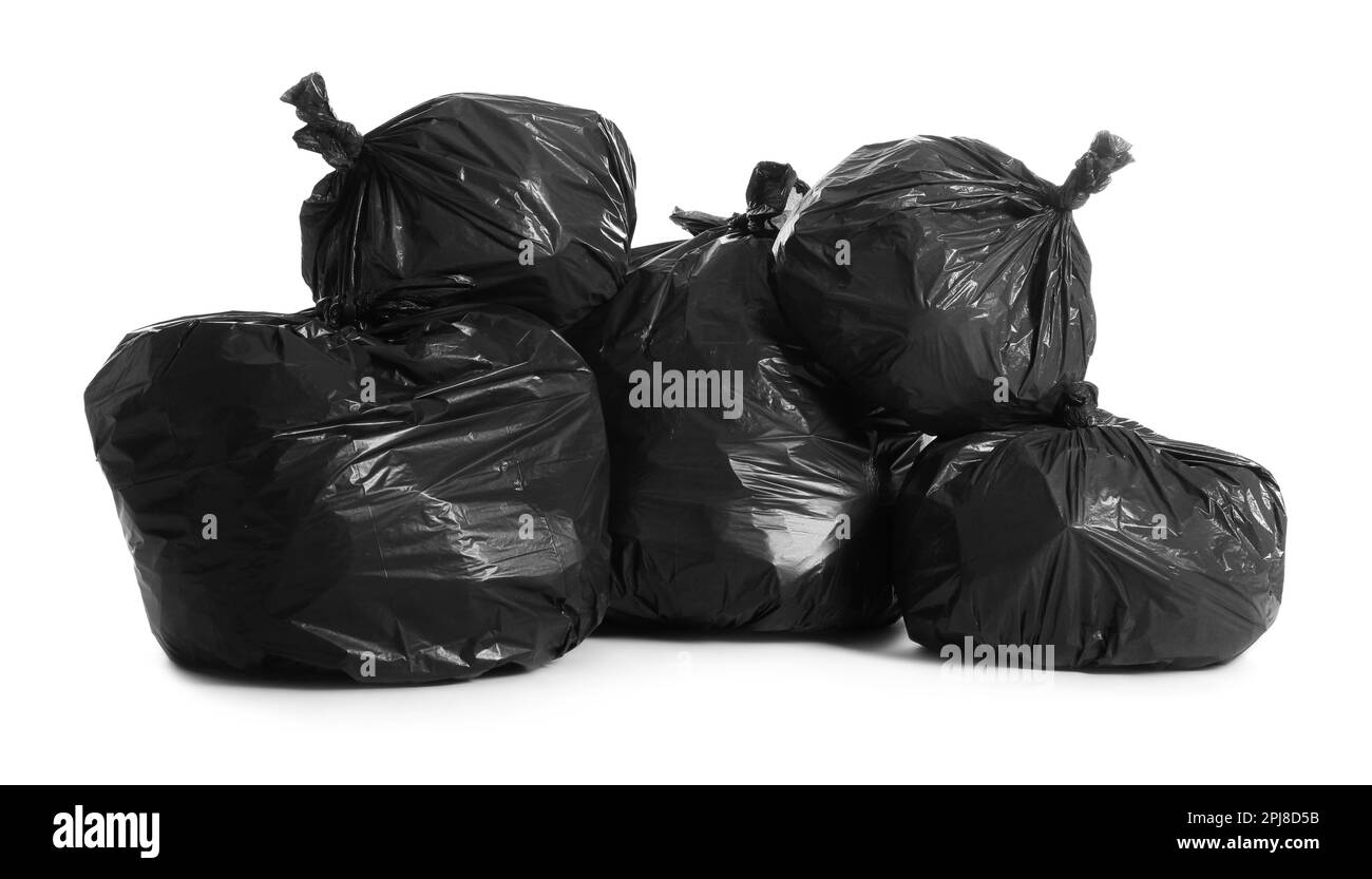 Black trash bags full of garbage on white background Stock Photo Alamy