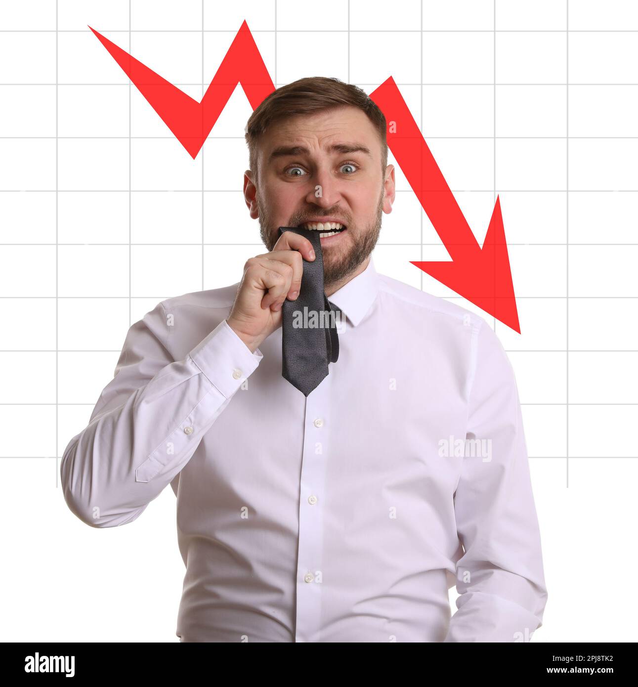 Worried businessman and illustration of falling down chart on white