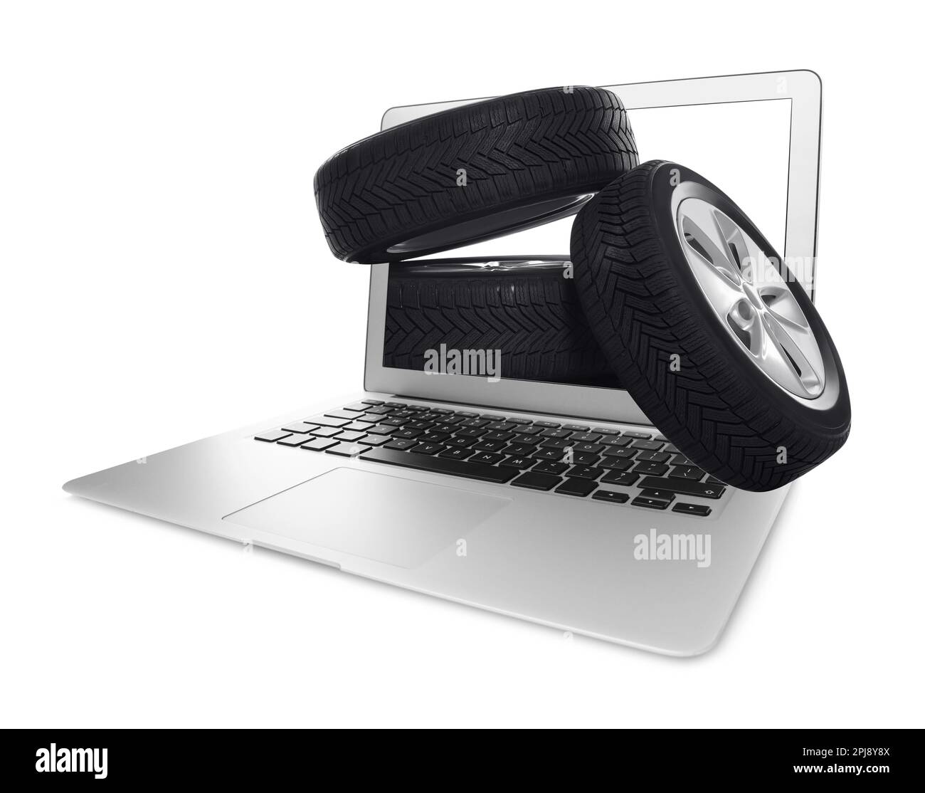 Online auto store, delivery service. Modern laptop and car tires on