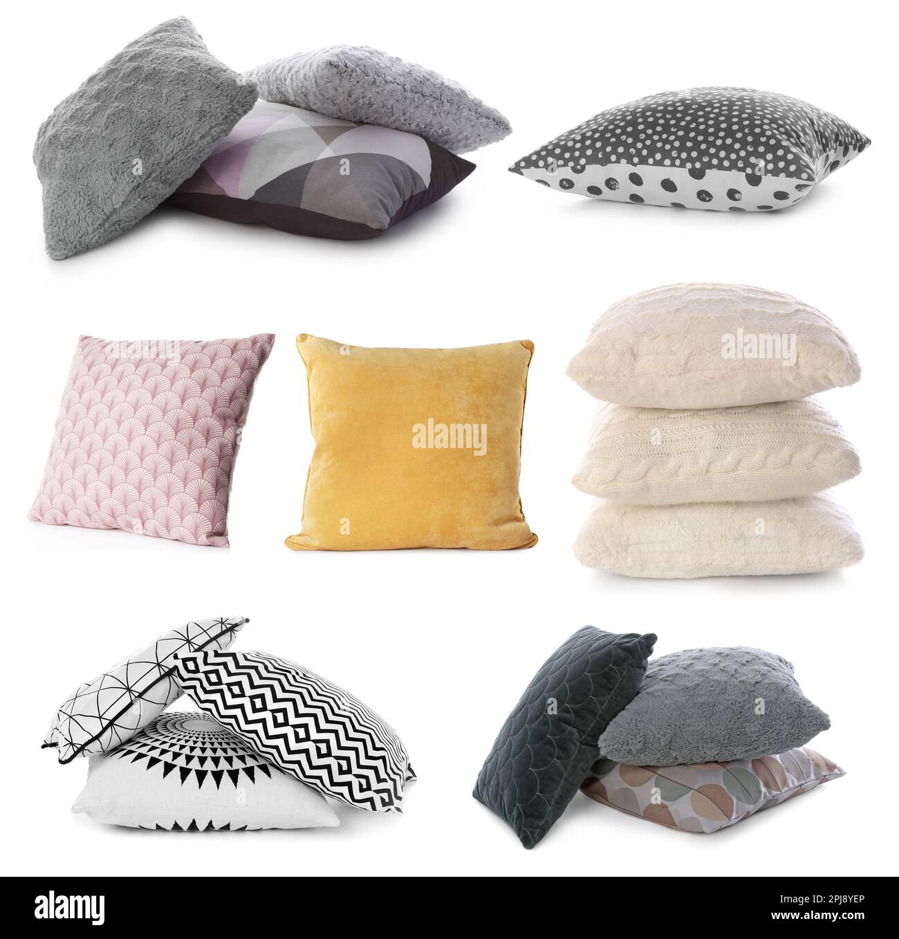 Set with different soft pillows on white background Stock Photo