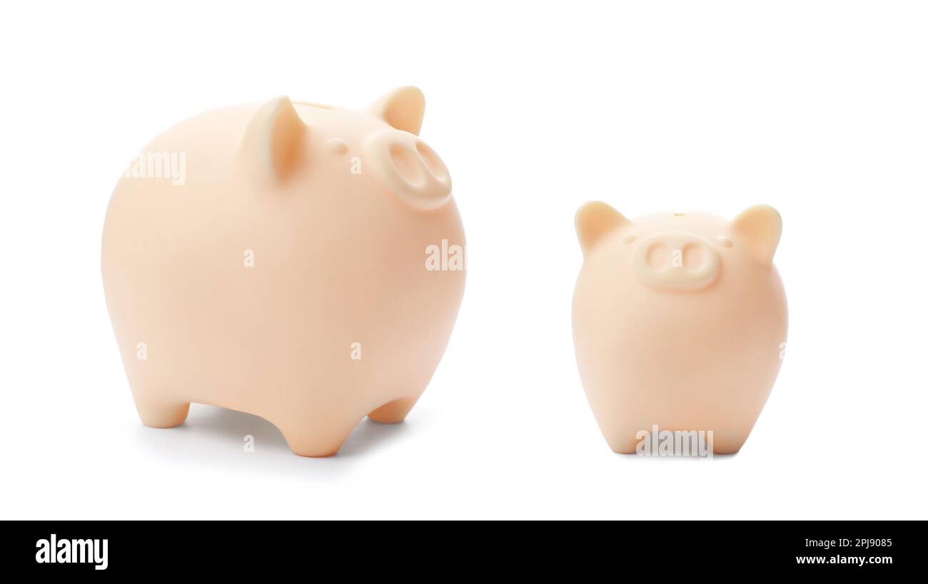 Pink ceramic piggy banks on white background Stock Photo - Alamy