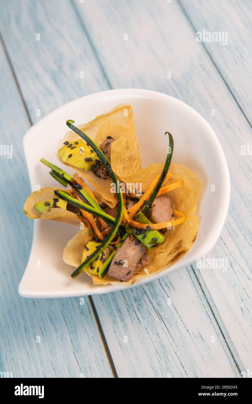 Brick with marinated red tuna, soy sauce, nuoc mam, ginger, black