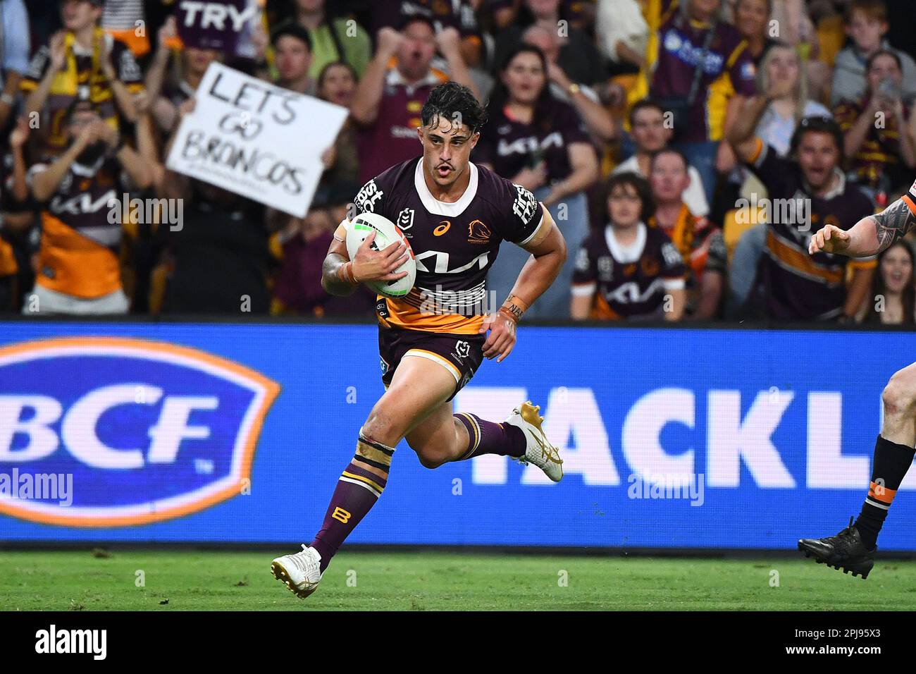 https://c8.alamy.com/comp/2PJ95X3/kotoni-staggs-of-the-broncos-scores-a-try-during-the-nrl-round-5-match-between-the-brisbane-broncos-and-the-wests-tigers-at-suncorp-stadium-in-brisbane-saturday-april-1-2023-aap-imagejono-searle-no-archiving-editorial-use-only-strictly-editorial-use-only-no-commercial-use-no-books-2PJ95X3.jpg