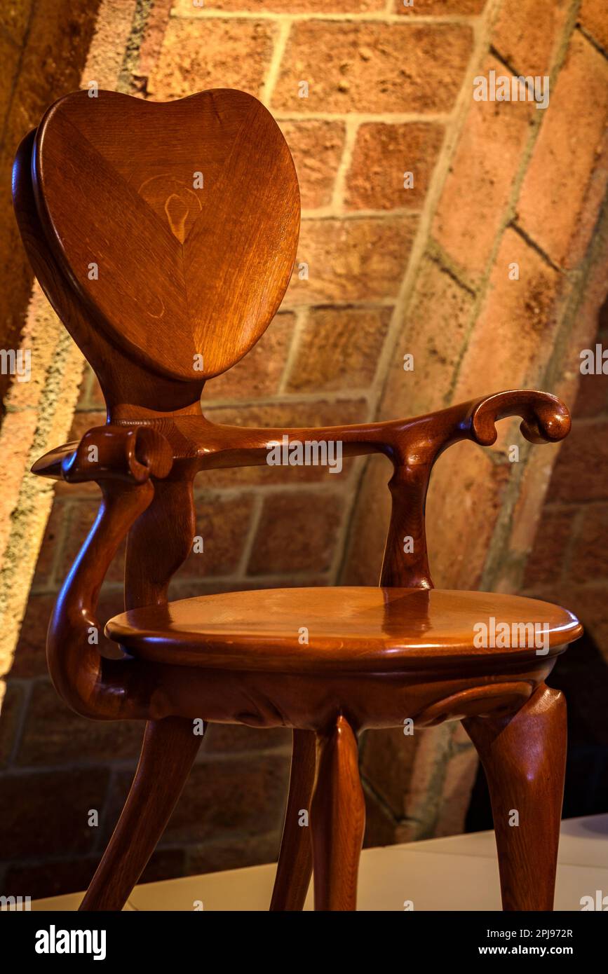 Chair designed by Antoni Gaudí for the Casa Calvet and exhibited in an exhibition inside Casa Milà - La Pedrera (Barcelona, Catalonia, Spain) Stock Photo