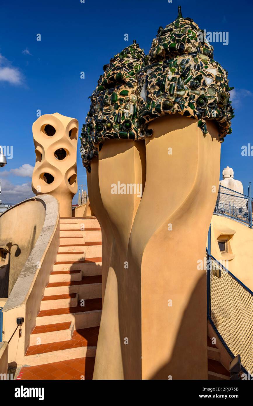 Chimneys in the shape of warrior soldiers on the rooftop terrace of Casa Milà - La Pedrera covered with trencadis made of glass bottles (Barcelona) Stock Photo