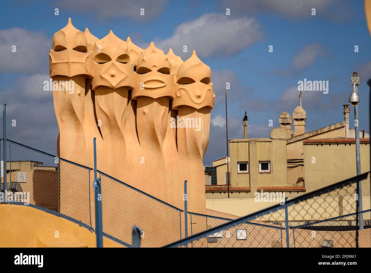 Chimneys in the shapes of soldiers / warriors on the rooftop of Casa Milà - La Pedrera designed by Antoni Gaudí (Barcelona, Catalonia, Spain) Stock Photo