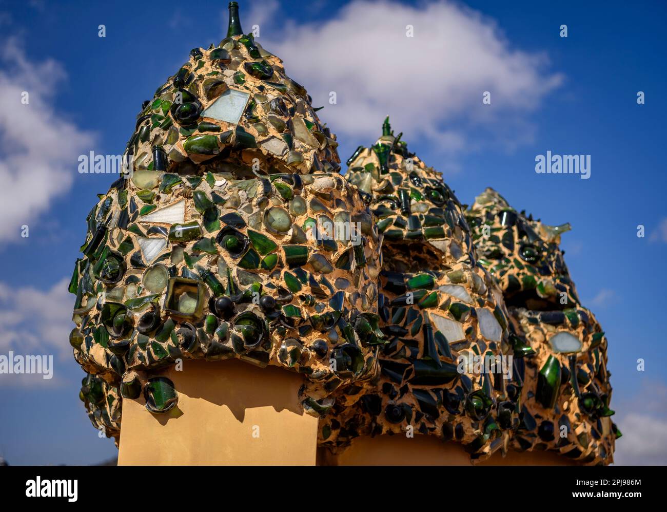 Chimneys in the shape of warrior soldiers on the rooftop terrace of Casa Milà - La Pedrera covered with trencadis made of glass bottles (Barcelona) Stock Photo