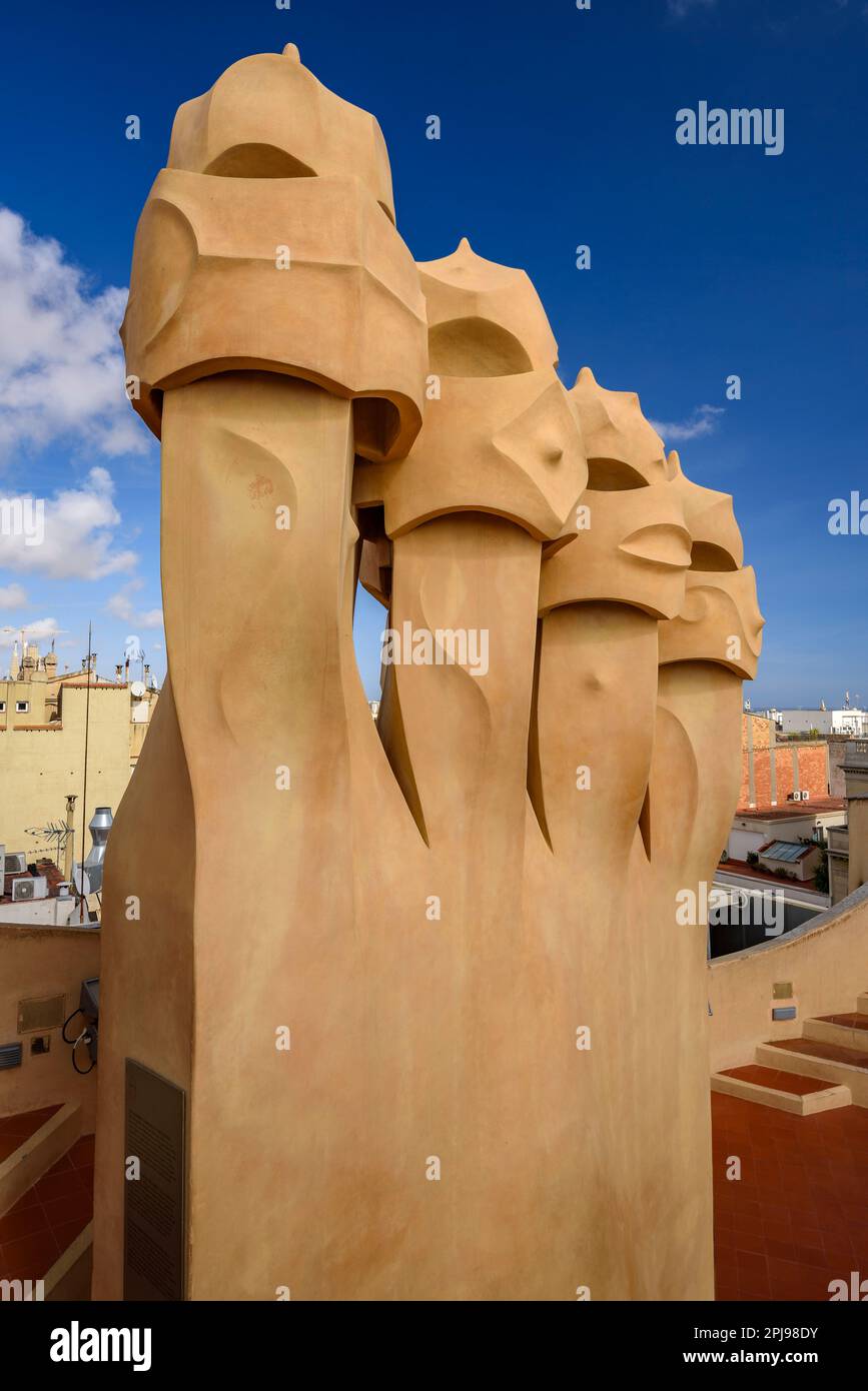 Chimneys in the shapes of soldiers / warriors on the rooftop of Casa Milà - La Pedrera designed by Antoni Gaudí (Barcelona, Catalonia, Spain) Stock Photo