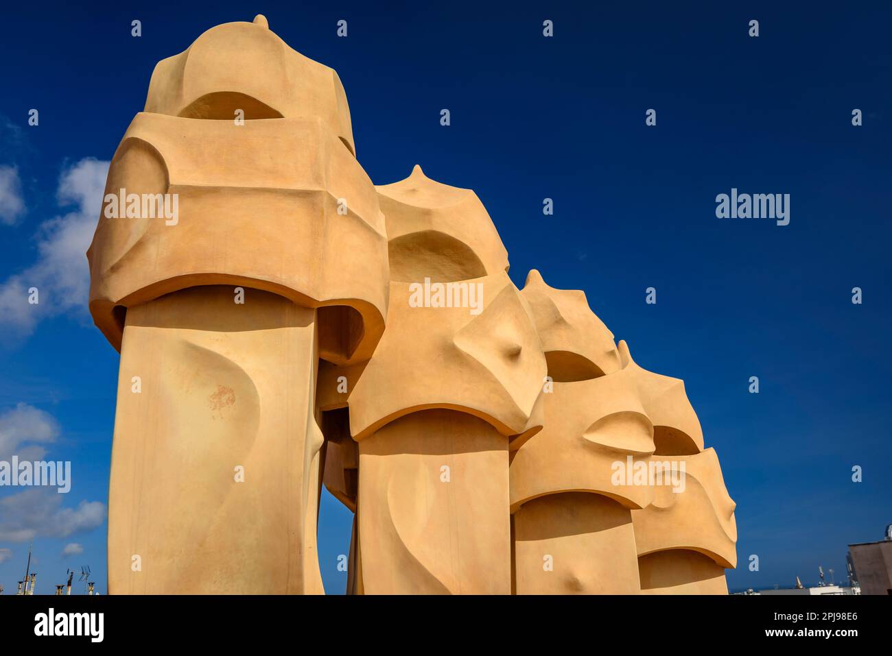 Chimneys in the shapes of soldiers / warriors on the rooftop of Casa Milà - La Pedrera designed by Antoni Gaudí (Barcelona, Catalonia, Spain) Stock Photo