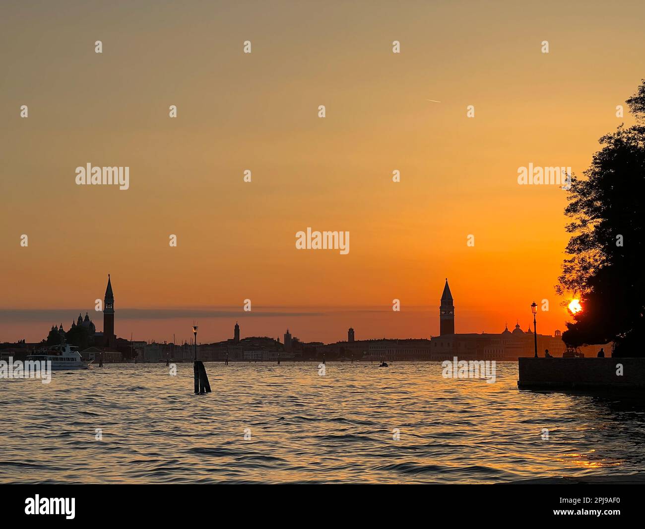 Venice lagoon skyline at sunset Stock Photo - Alamy