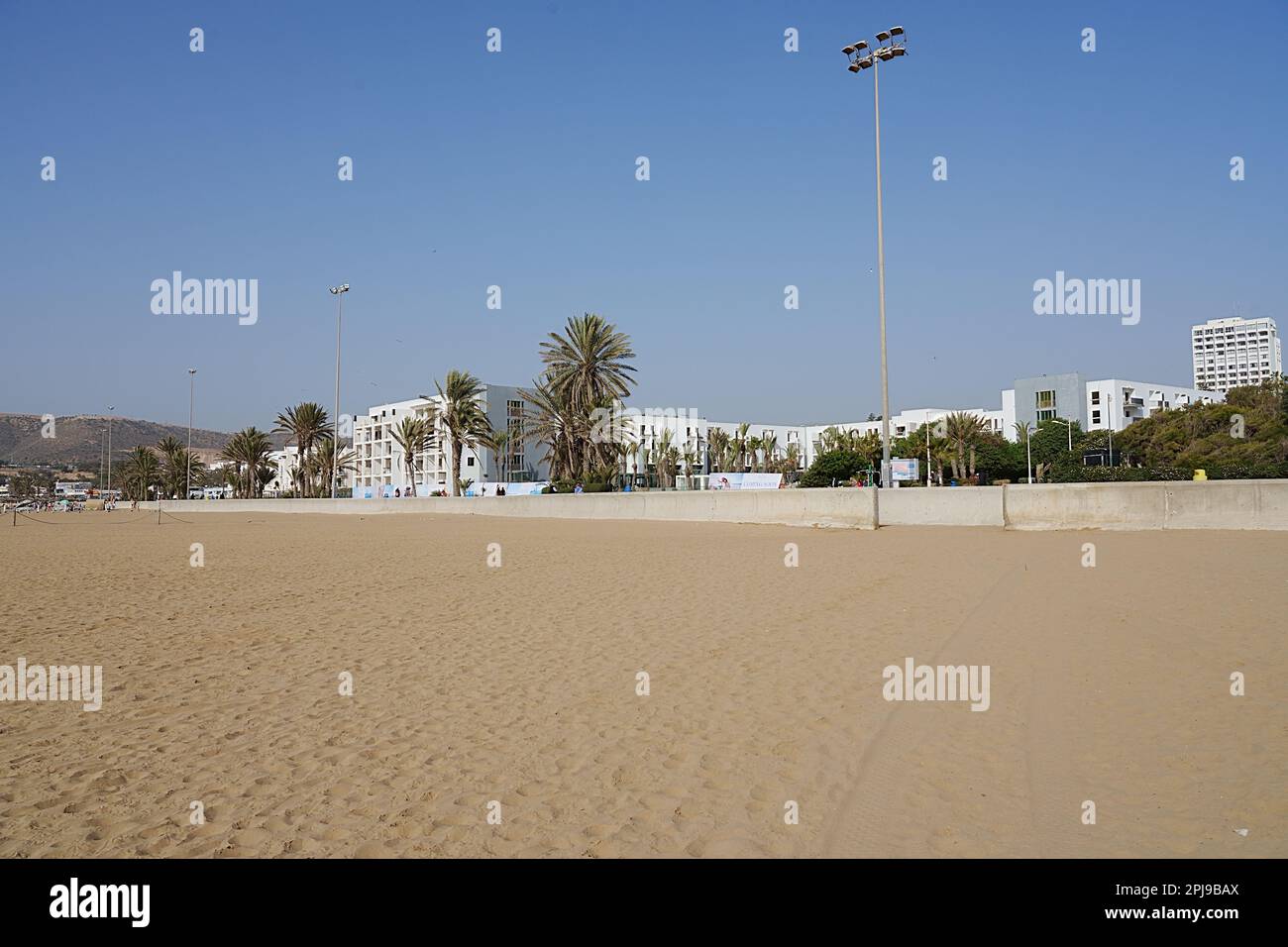 Beach With Promenade In African AGADIR City In Morocco Clear Blue Sky beach-with-promenade-in-african-agadir-city-in-morocco-clear-blue-sky