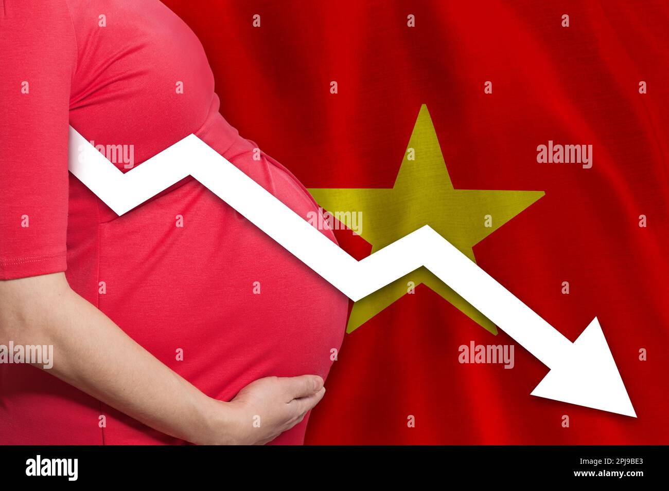 Vietnamese pregnant woman on flag background. Falling fertility rate in