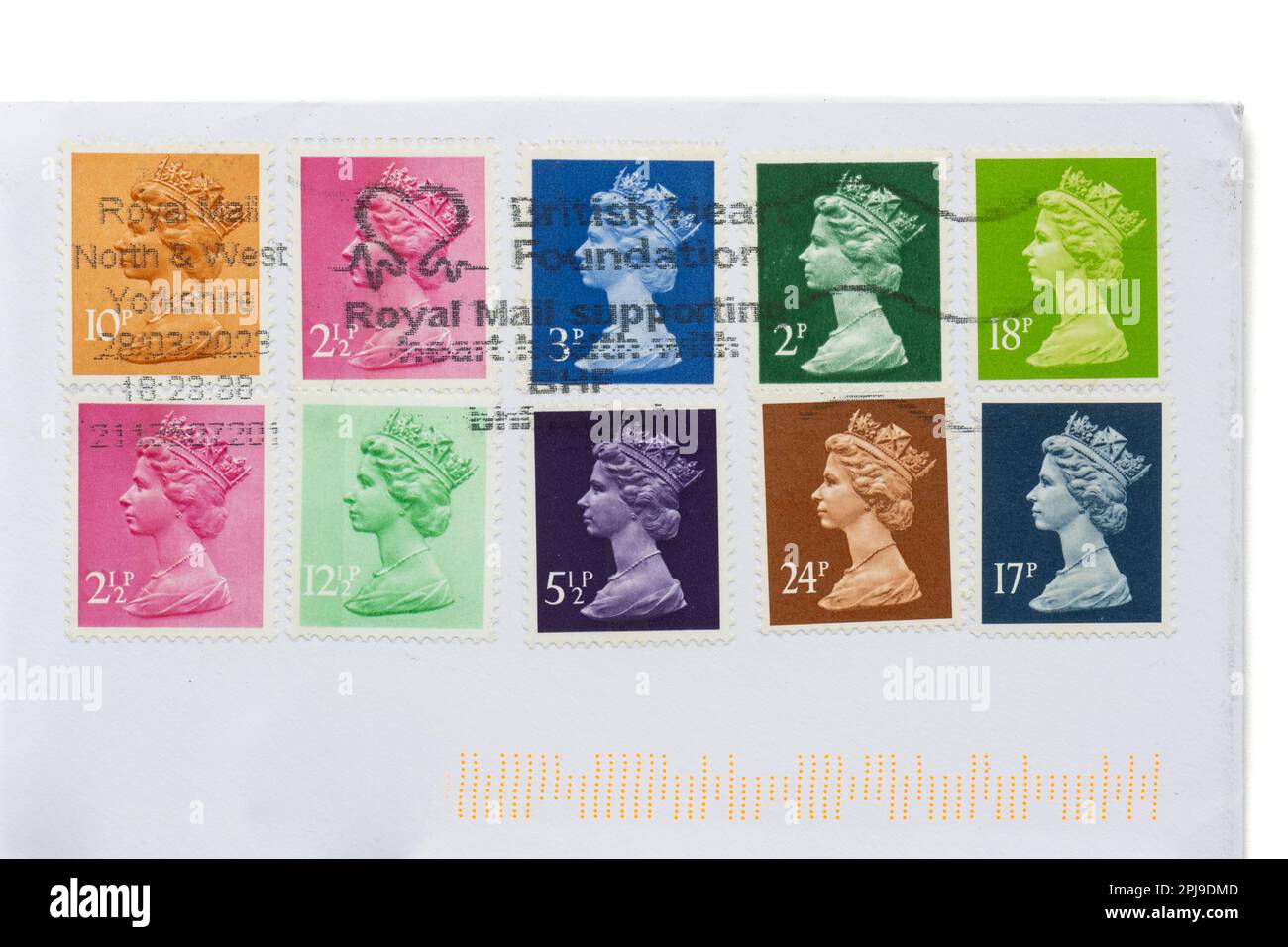 Using up old non-barcoded stamps during 6 month grace period to 31 July 2023 (post marked 28 March 2023) when only stamps with bar code can be used Stock Photo