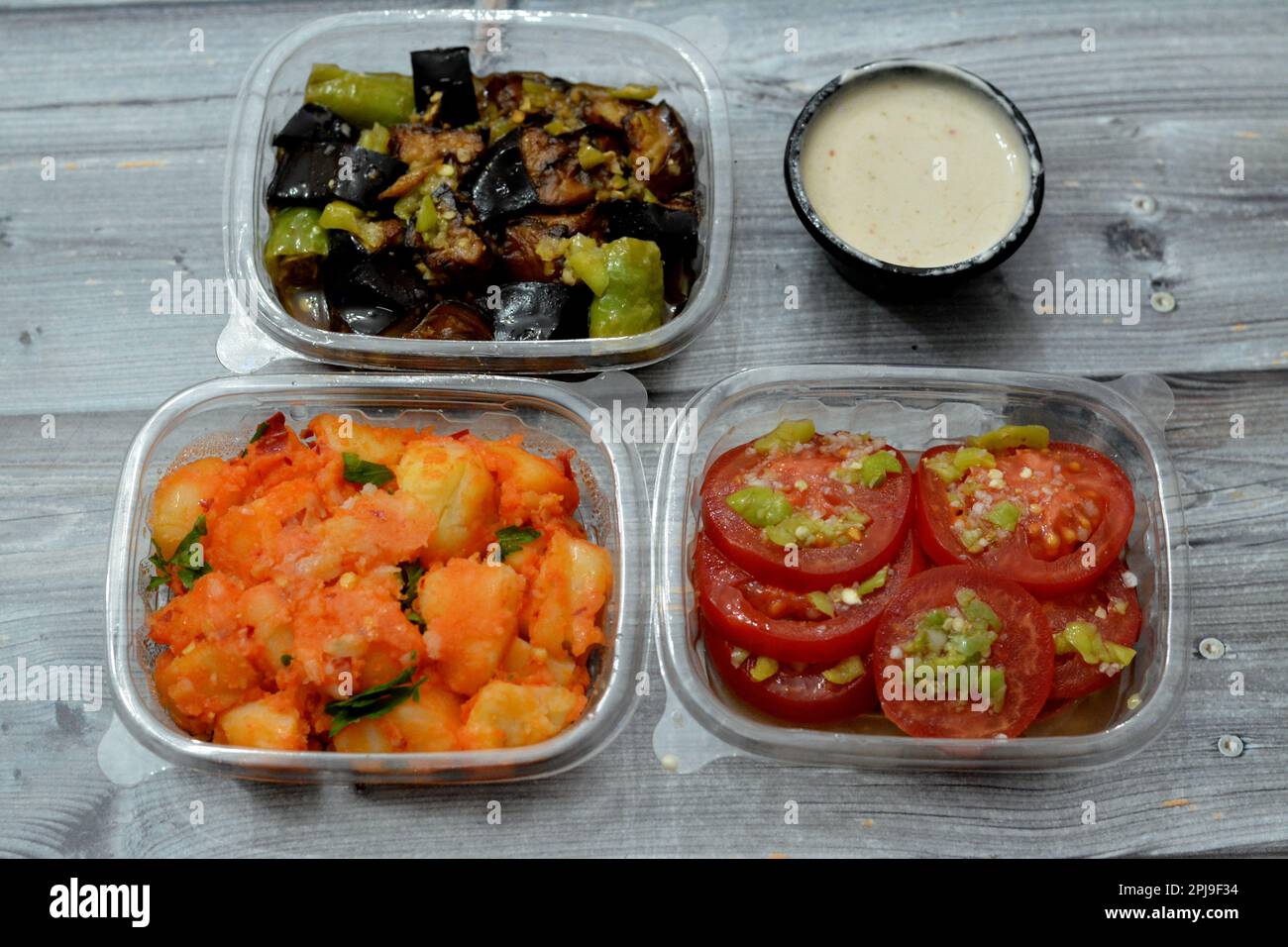 Egyptian pickled eggplant aubergine and green pepper, pickled potatoes