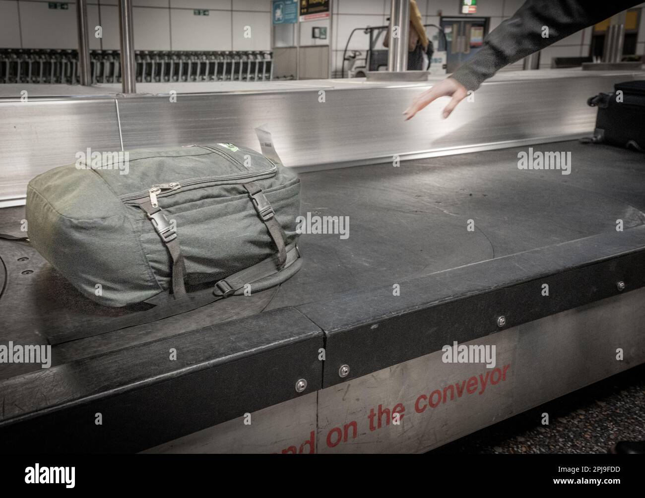 Airport conveyor belt, baggage reclaim, baggage handling lost baggage, international airport
