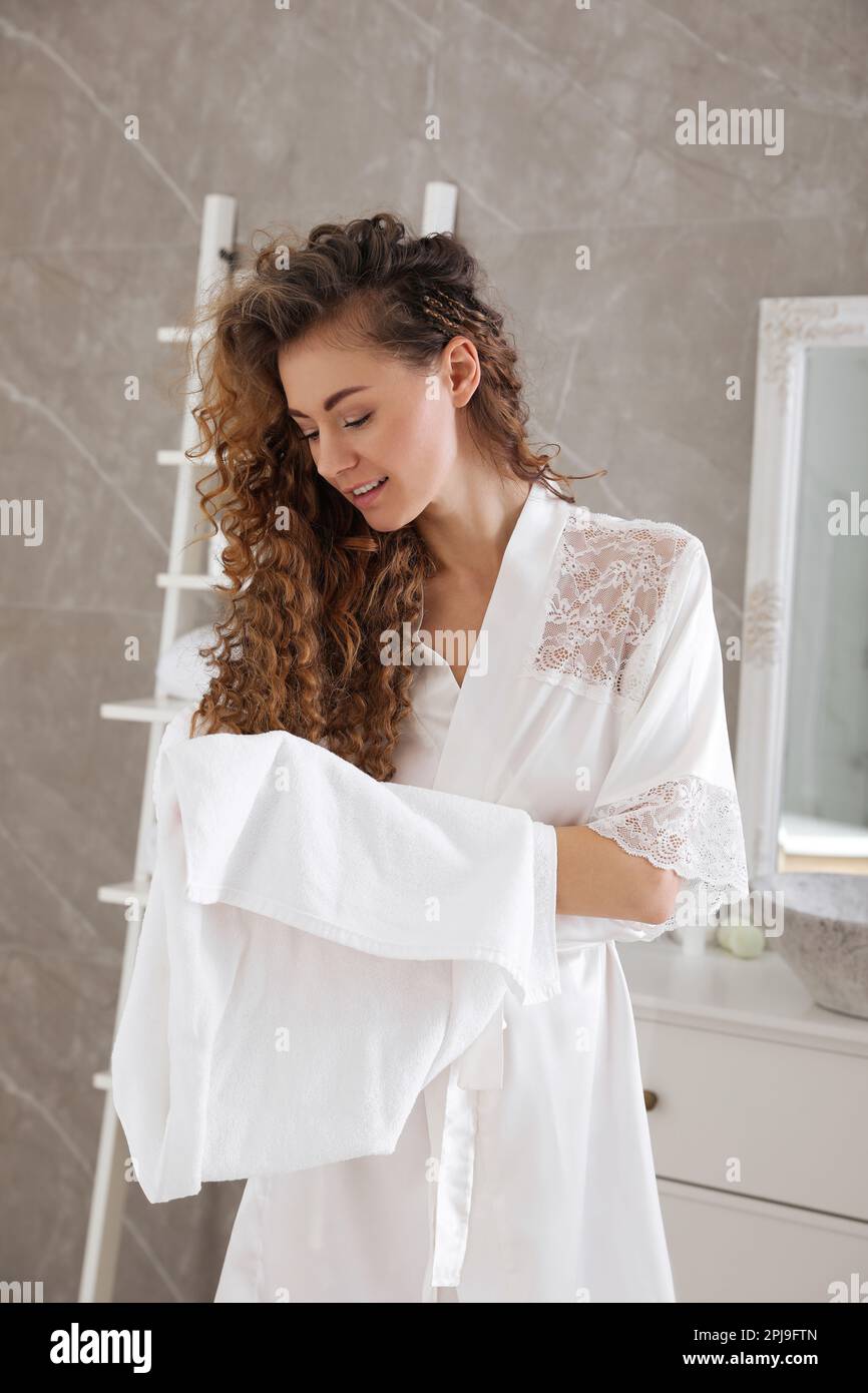 Beautiful woman drying hair with towel in bathroom Stock Photo Alamy