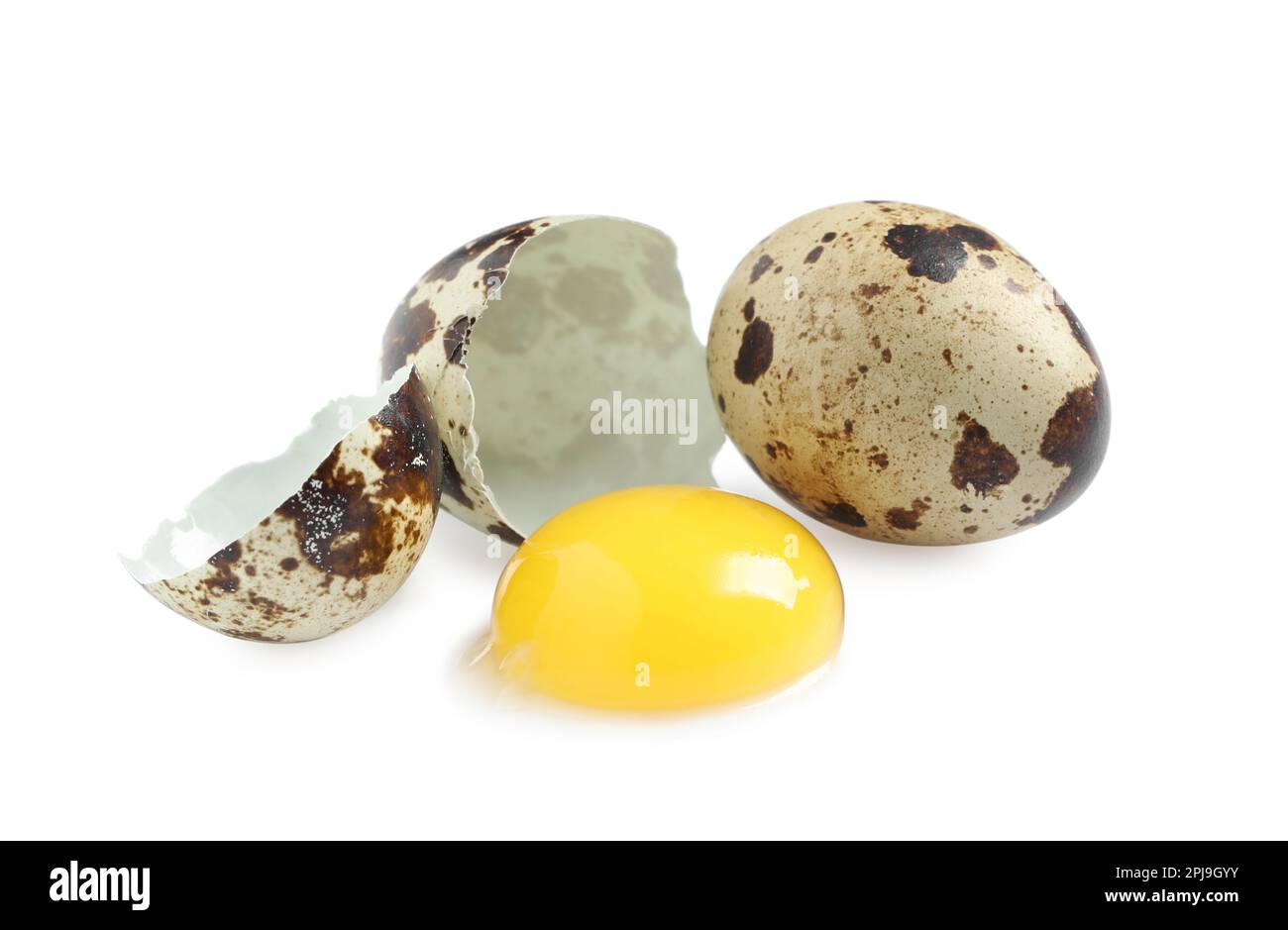 Whole and cracked quail eggs on white background Stock Photo - Alamy