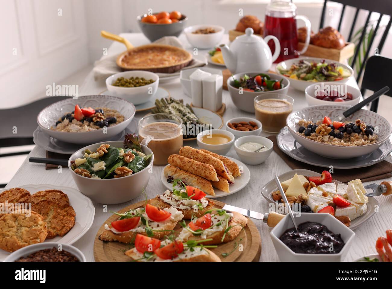Many different dishes served on buffet table for brunch Stock Photo
