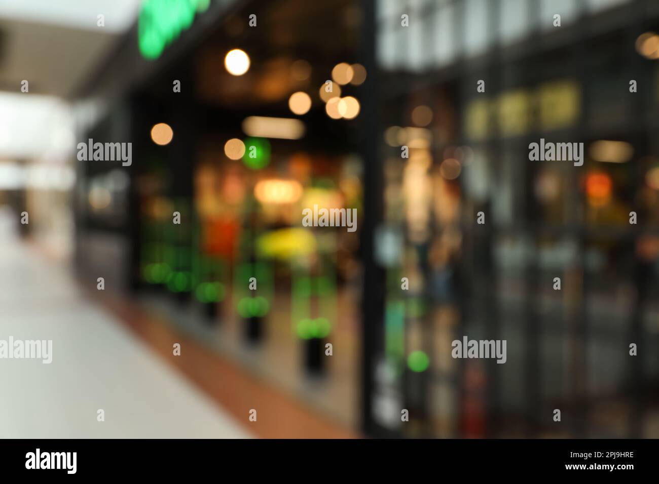Blurred view of shopping mall interior. Bokeh effect Stock Photo - Alamy
