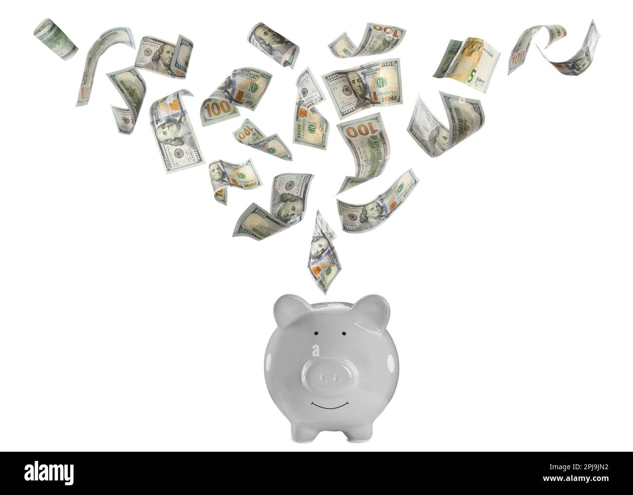 Dollar banknotes falling into piggy bank on white background Stock ...