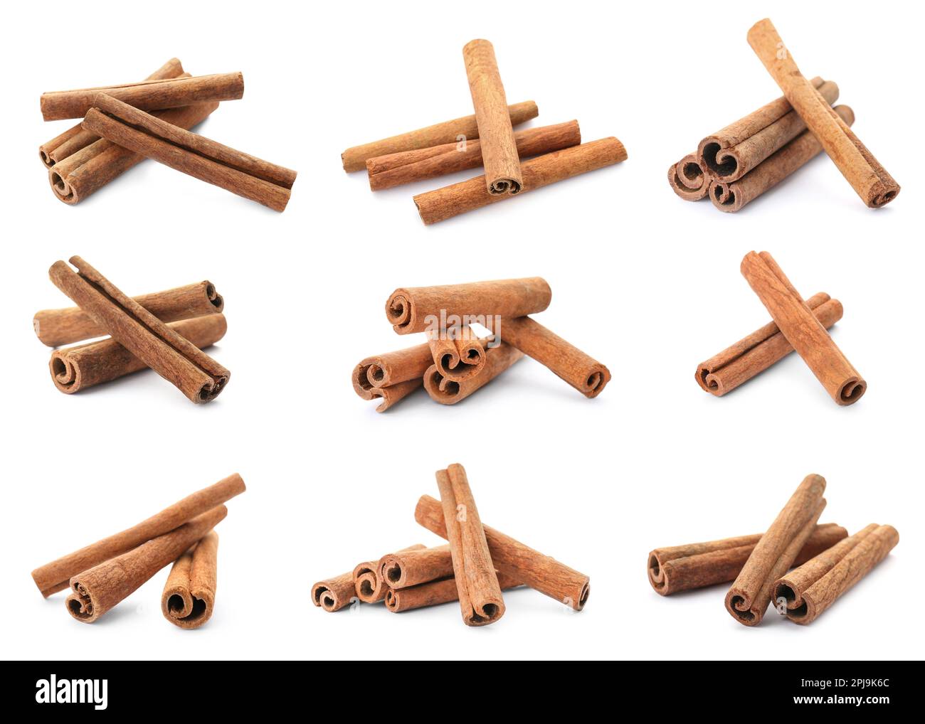 Set with aromatic cinnamon sticks on white background Stock Photo