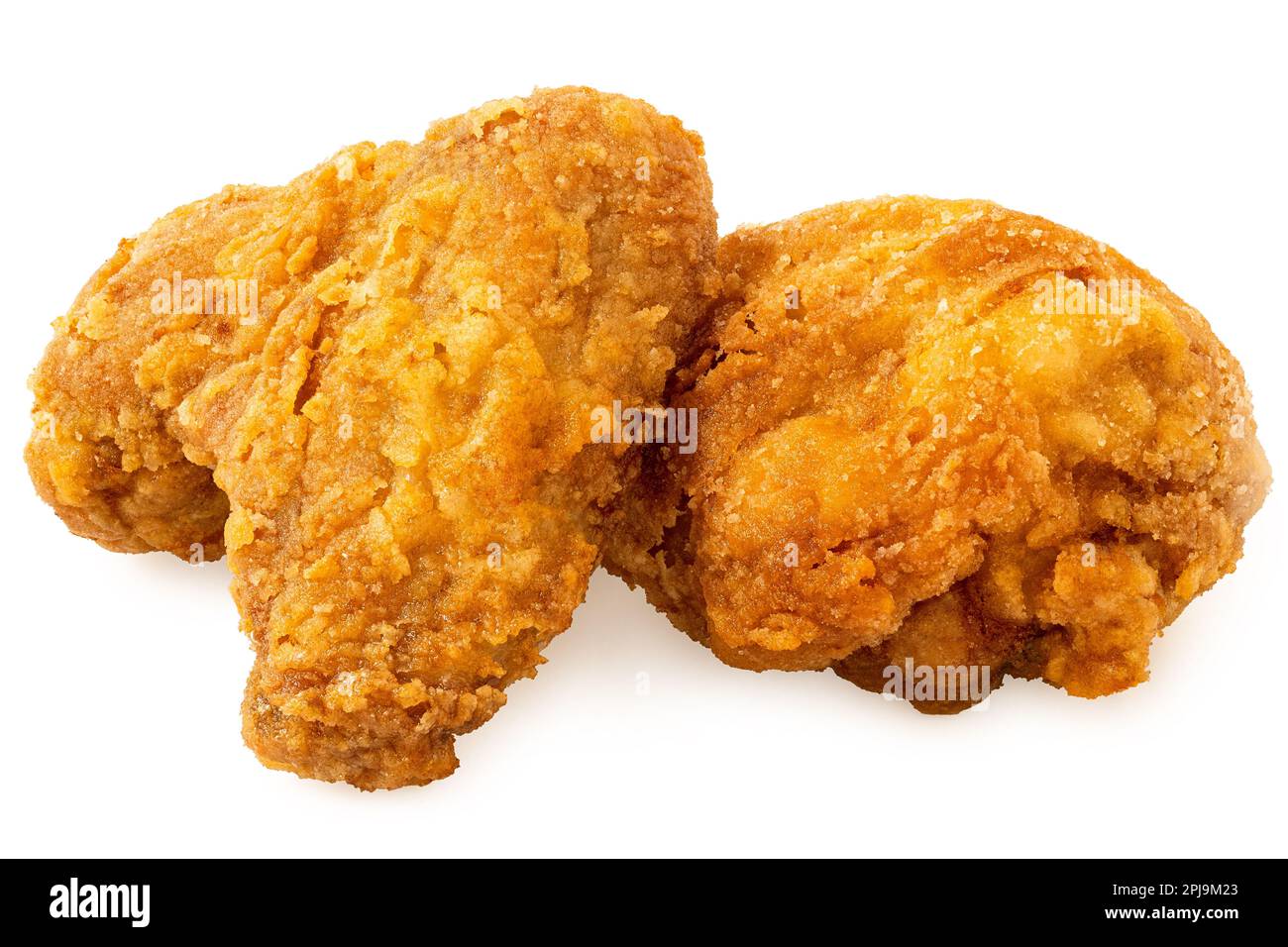 Crispy fried chicken pieces, drumstick and wing, isolated on white