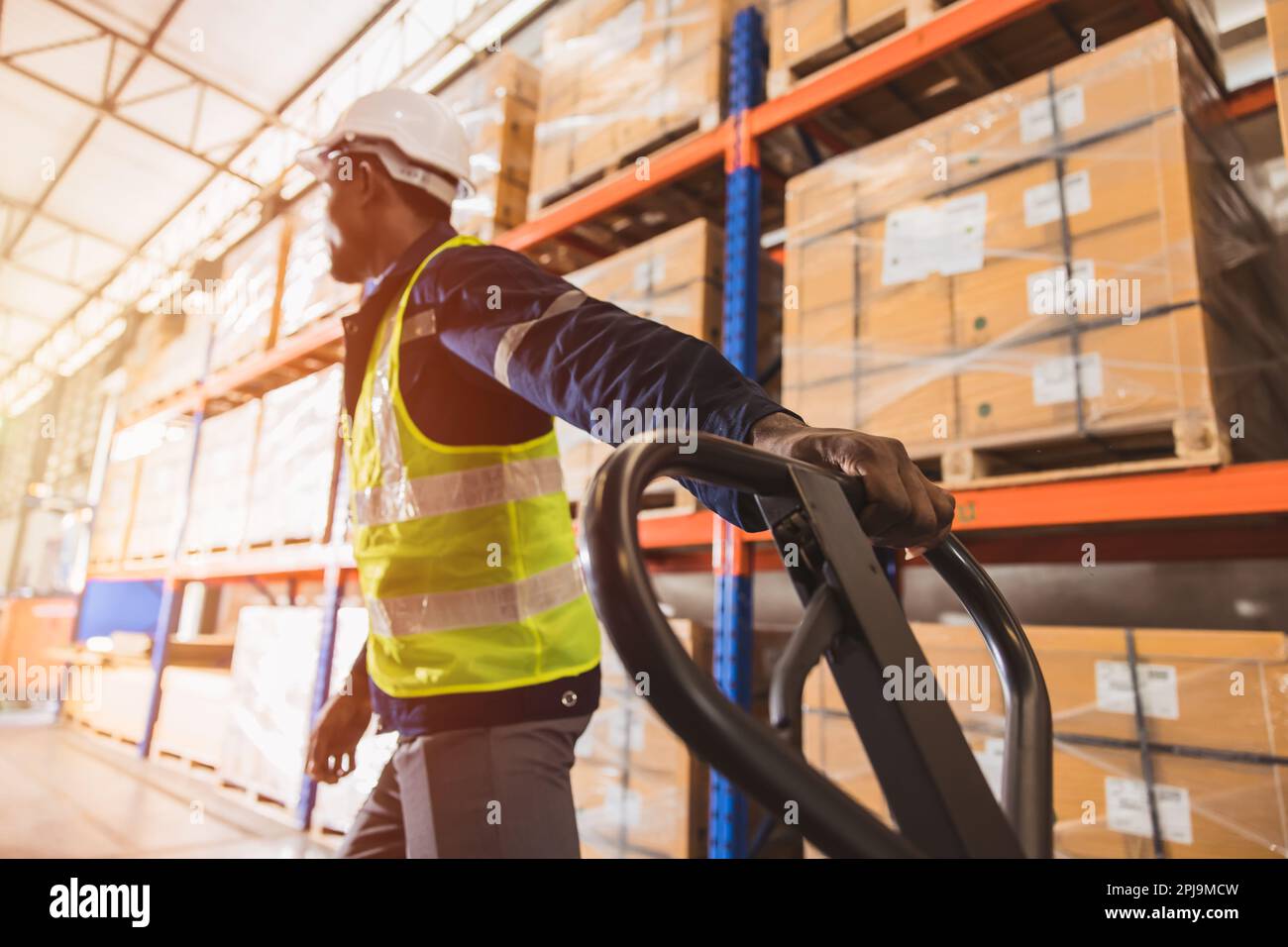 warehouse worker working for inventory store management product logistics shipping industry Stock Photo