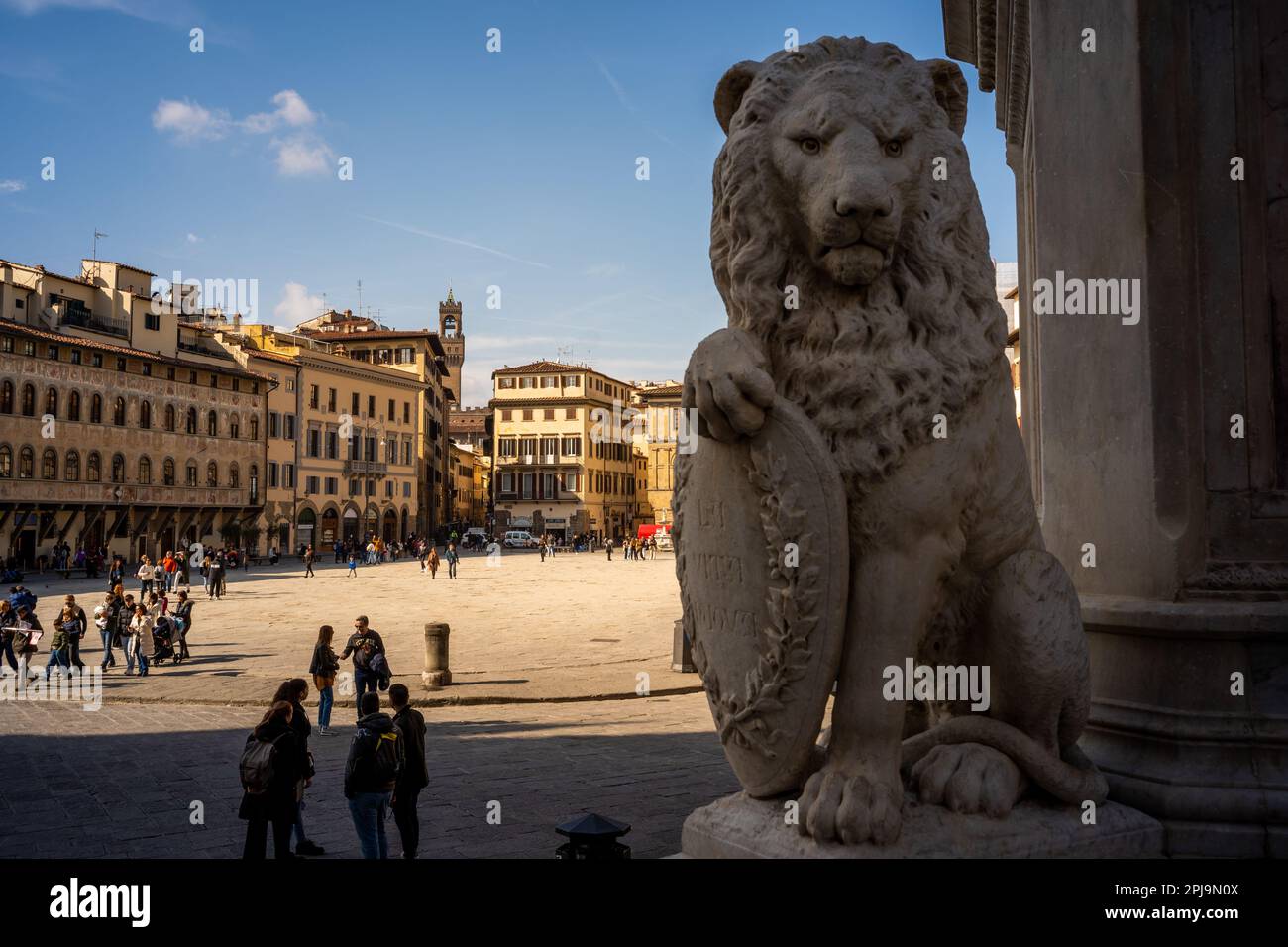 Marzocco lion on the base of the Dante monument overlooking Piazza Santa Croce, Florence Stock Photo
