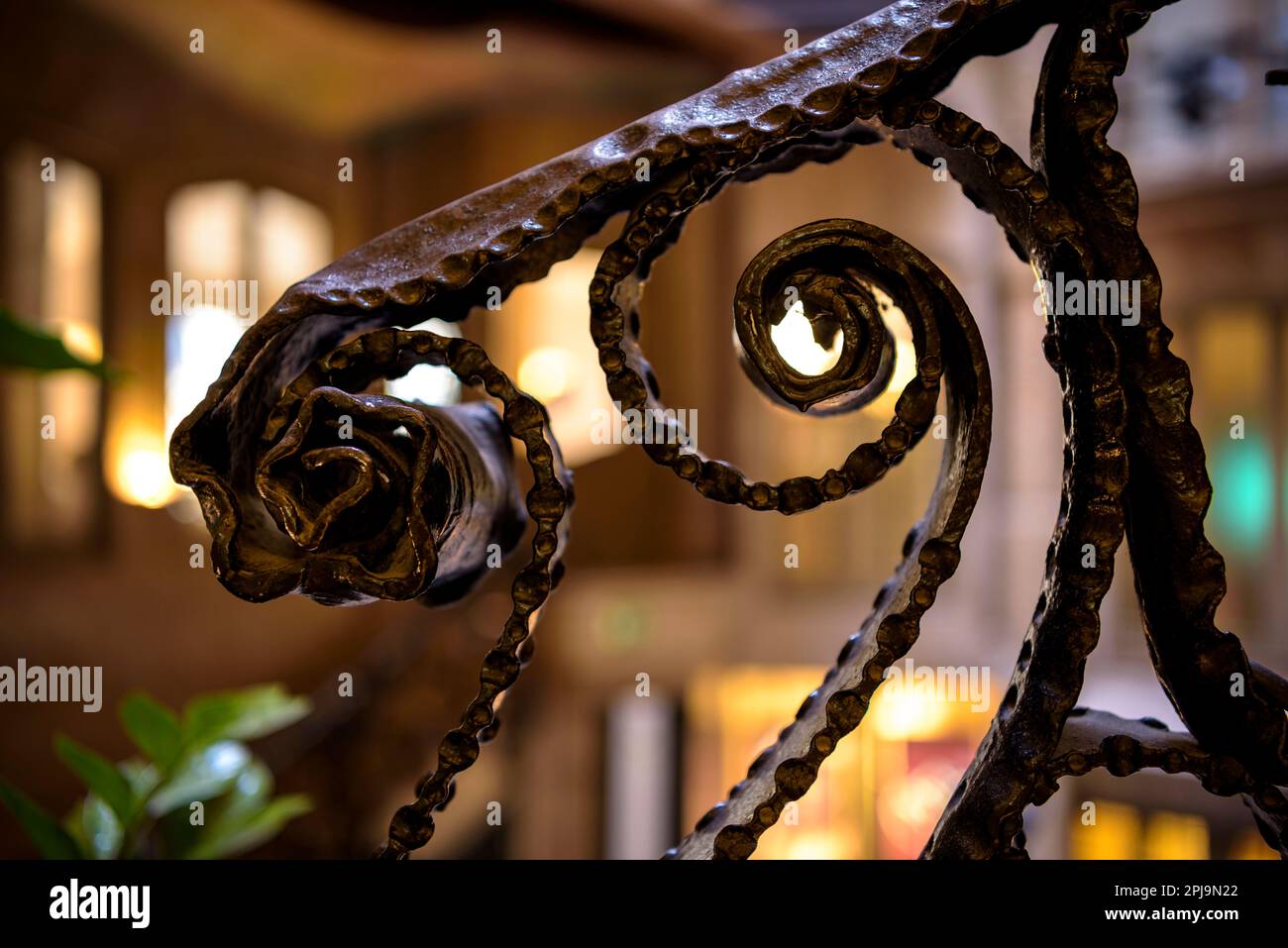 Helical shapes of wrought iron on the railing of the stairs to the main floor of La Pedrera - Casa Milà (Barcelona, Catalonia, Spain) Stock Photo