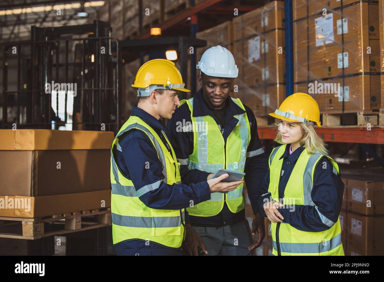 engineer staff worker working together. black african with caucasian male and woman worker team