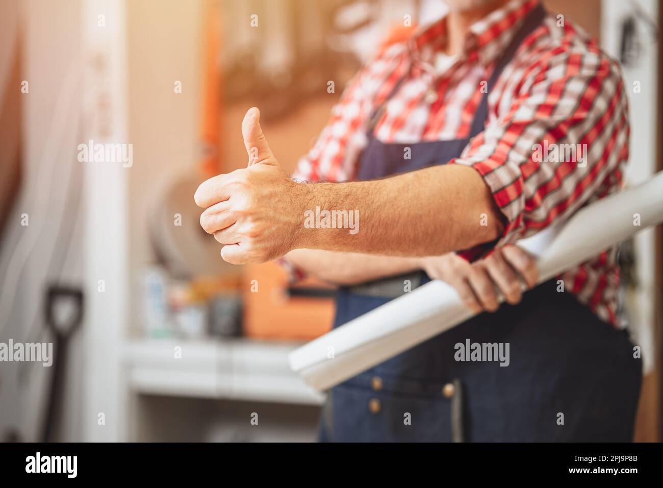 construction builder hand worker thumbs up for good symbol satisfied like love finished jobs Stock Photo