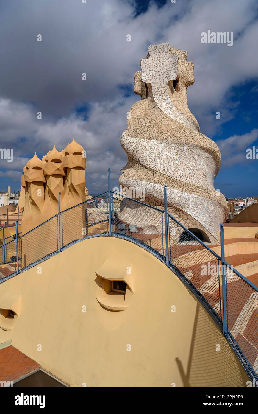 Top of the stairwell with the 4-armed cross designed by Gaudí on the rooftop terrace of Casa Milà - La Pedrera (Barcelona, Catalonia, Spain) Stock Photo
