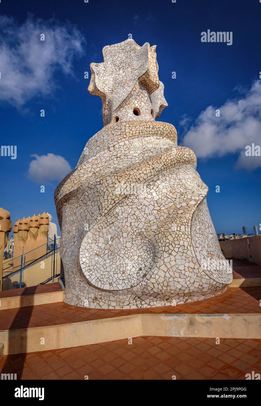 Top of the stairwell with the 4-armed cross designed by Gaudí on the rooftop terrace of Casa Milà - La Pedrera (Barcelona, Catalonia, Spain) Stock Photo