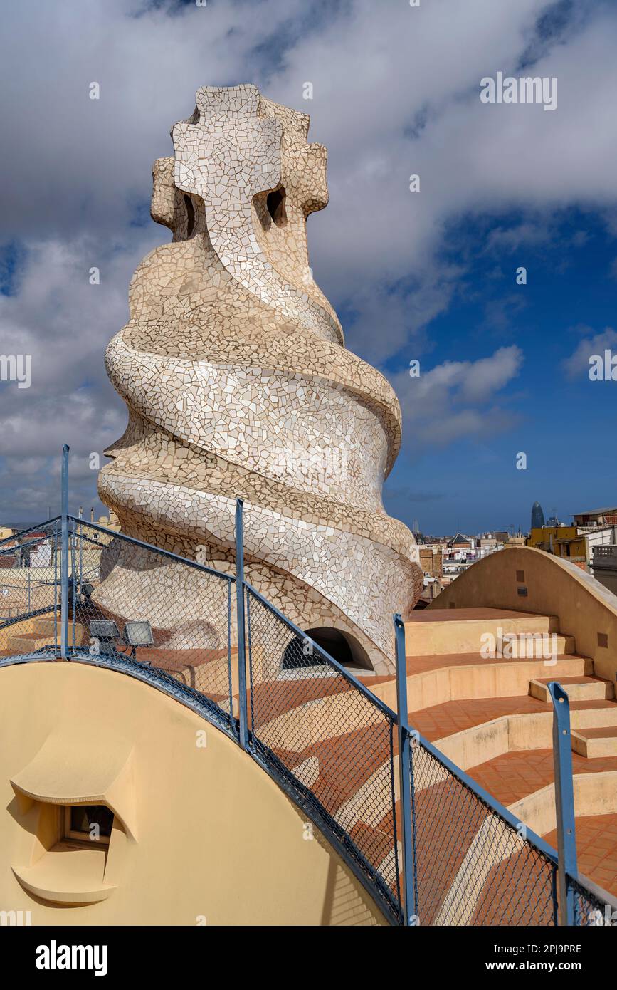 Top of the stairwell with the 4-armed cross designed by Gaudí on the rooftop terrace of Casa Milà - La Pedrera (Barcelona, Catalonia, Spain) Stock Photo