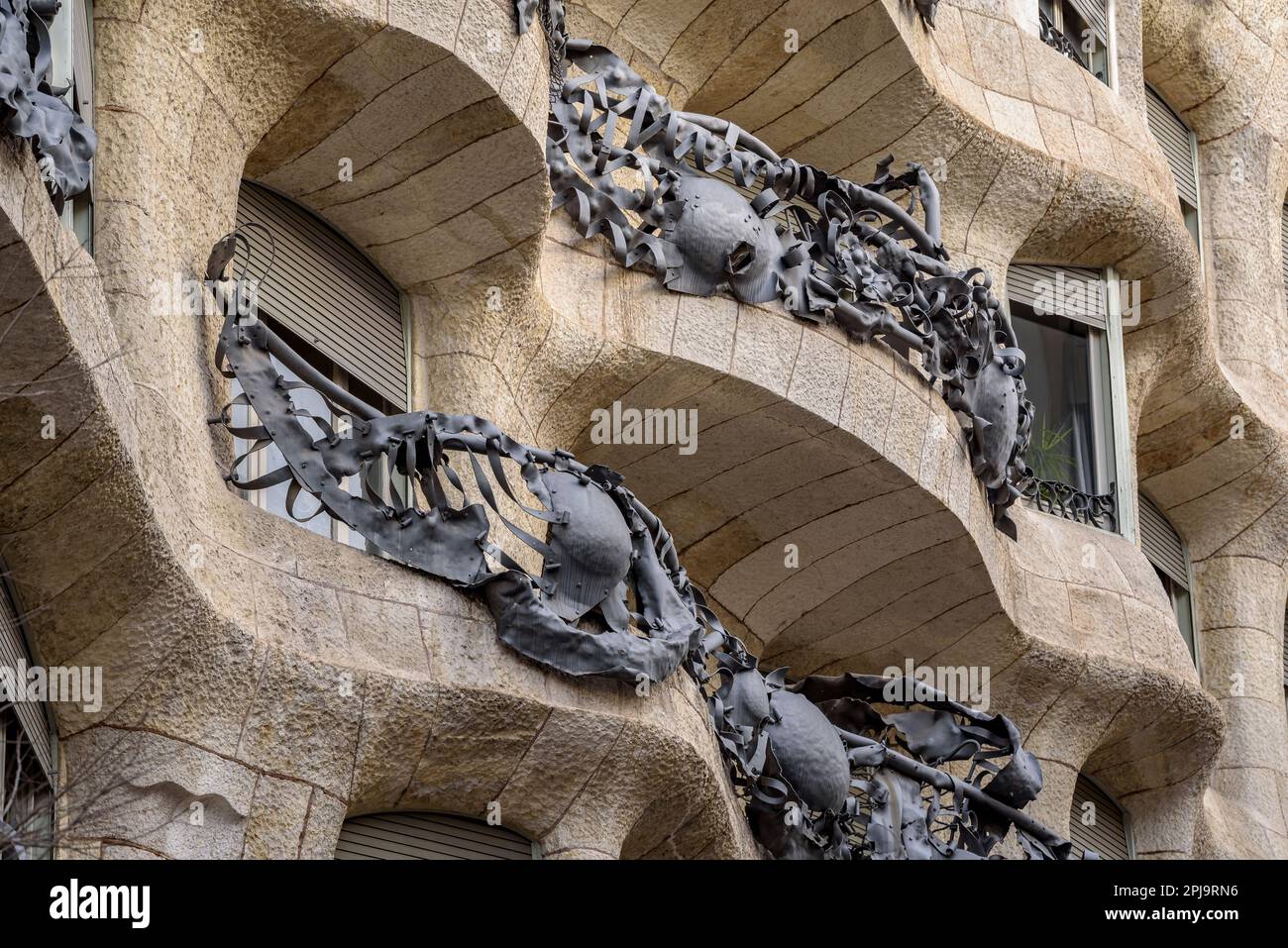 Wrought iron details on the railings of La Pedrera - Casa Milà, designed by Antoni Gaudí (Barcelona, Catalonia, Spain) ESP: Detalles de hierro forjado Stock Photo
