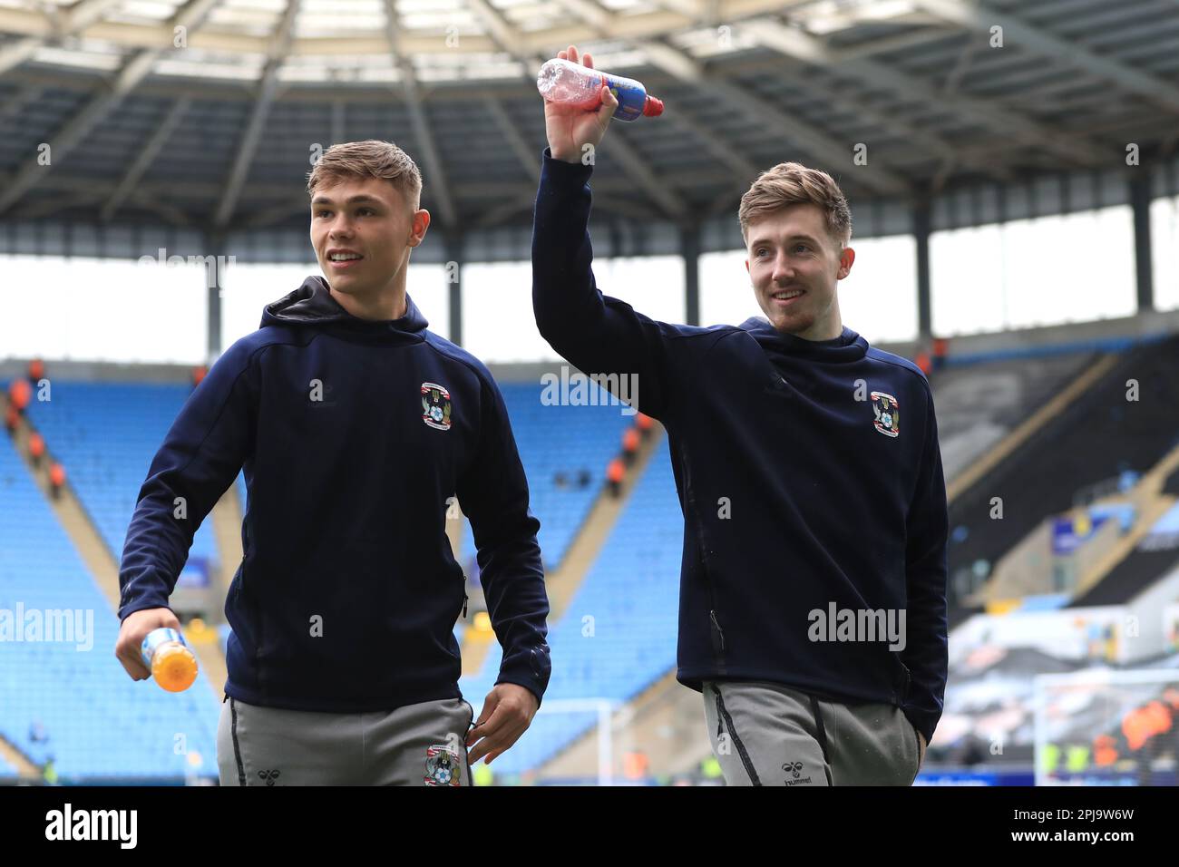 Coventry City's Callum Doyle (left) and Coventry City's Josh Eccles inside the stadium prior to kick-off of the Sky Bet Championship match at the Coventry Building Society Arena, Coventry. Picture date: Saturday April 1, 2023. Stock Photo